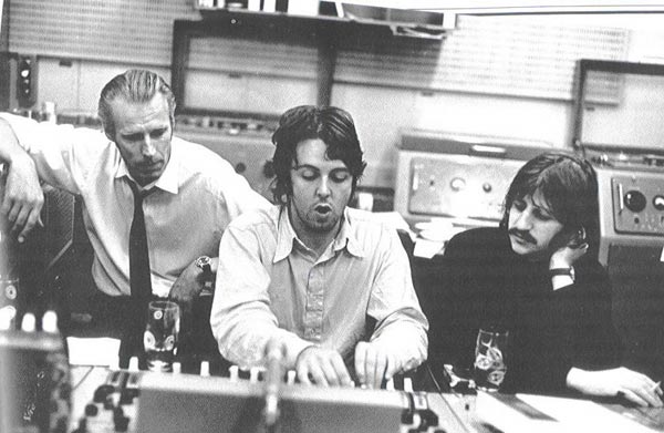 Paul McCartney in studio with George Martin